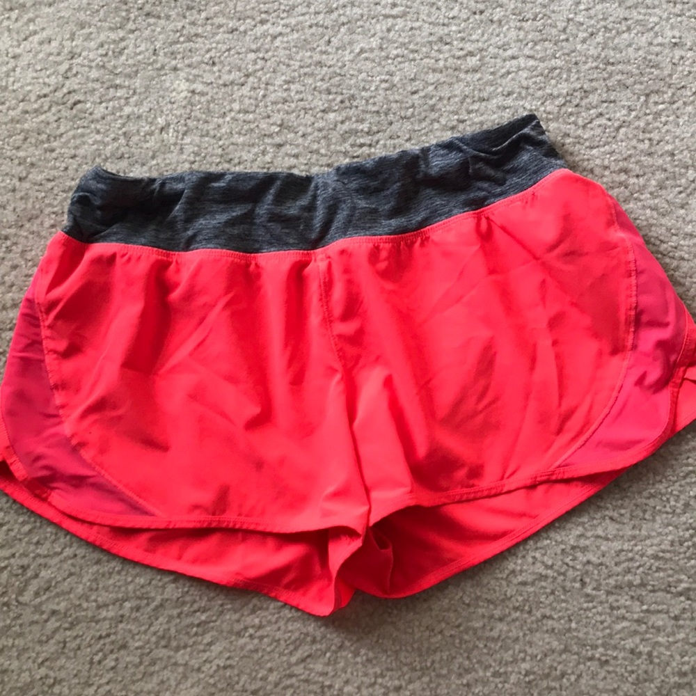 Coral colored Champion athletic shorts